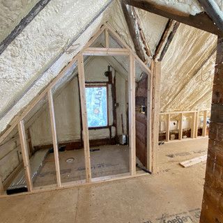 A room with a window in the attic is being built.