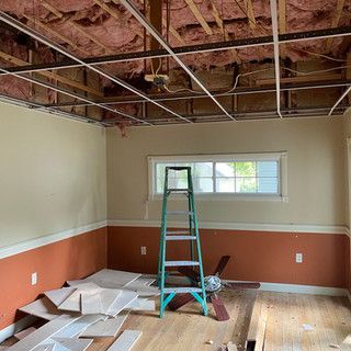 There is a ladder in the middle of the room.