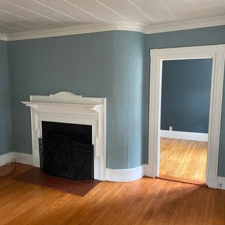 There is a fireplace in the middle of the room.