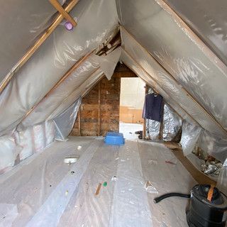 There is a vacuum cleaner in the attic.