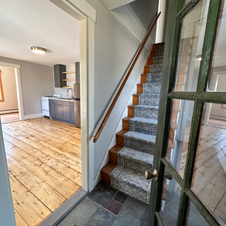 Stairs leading up to the second floor of a house