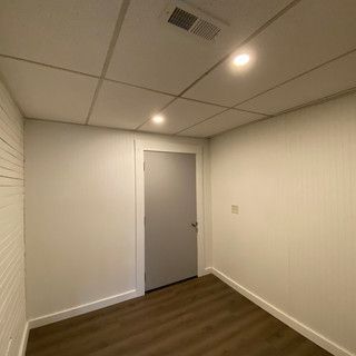 There is a door in the middle of the room.