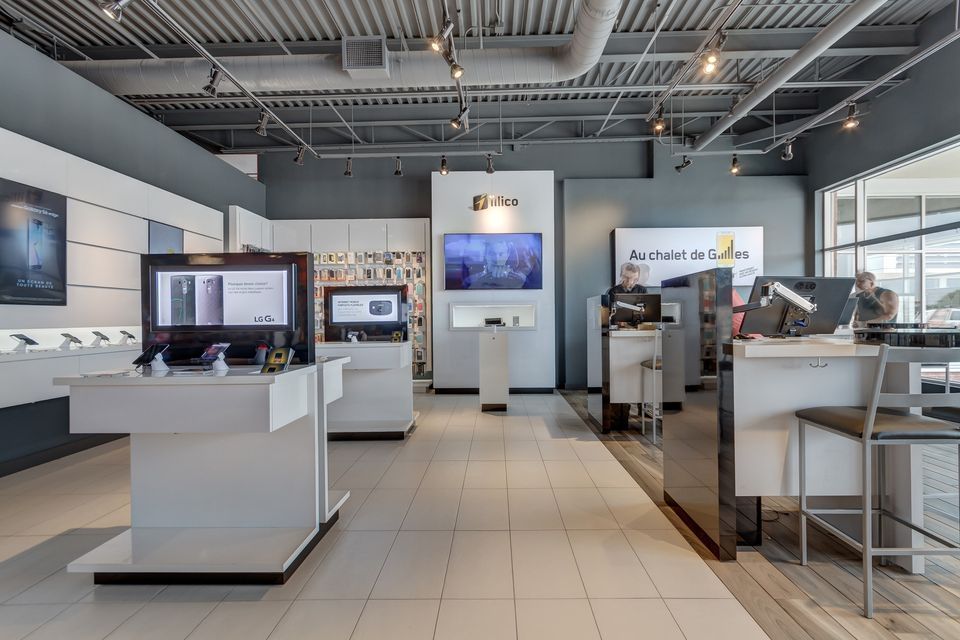 A store filled with lots of displays and tables.