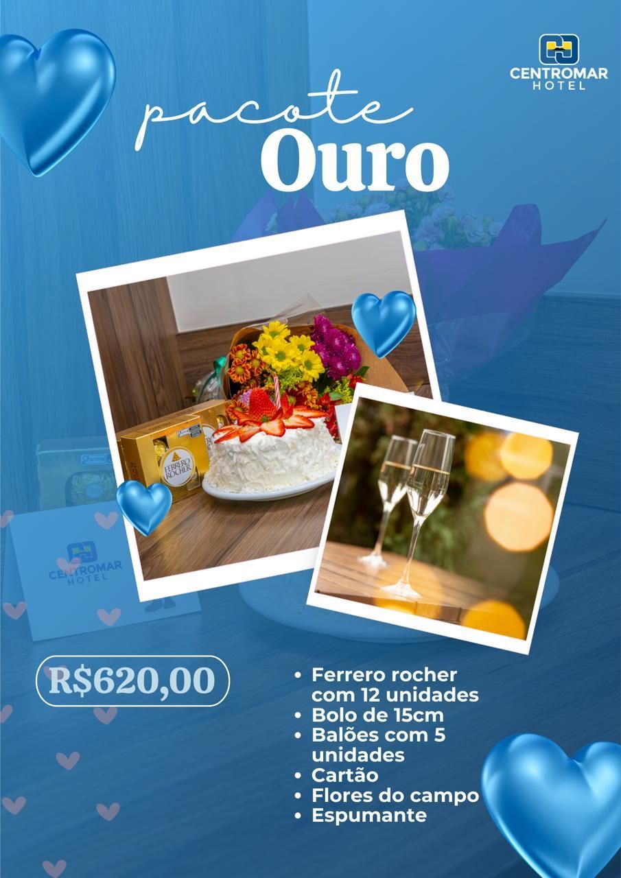 Uma foto de um bolo e duas taças de champanhe