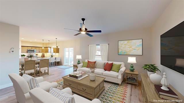 View from the living room into the dining and kitchen areas.