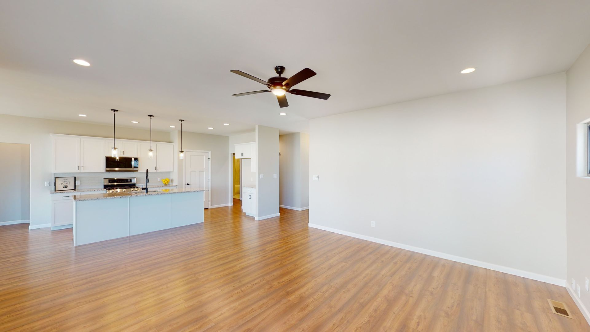 Casa De Pueblo great room with kitchen and living. room.