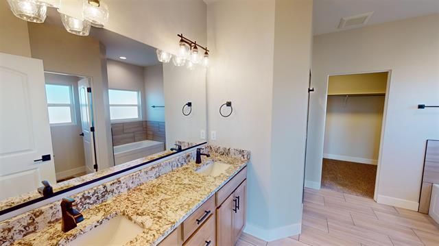 Tile work in a shower or bathroom of The Silverado model.