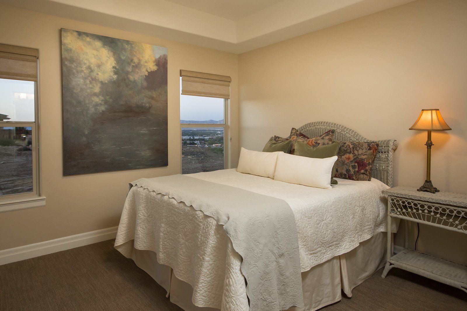 Queen Bed with Nightstand and artwork on wall | Integrity Homes | Grand Junction, CO 81501