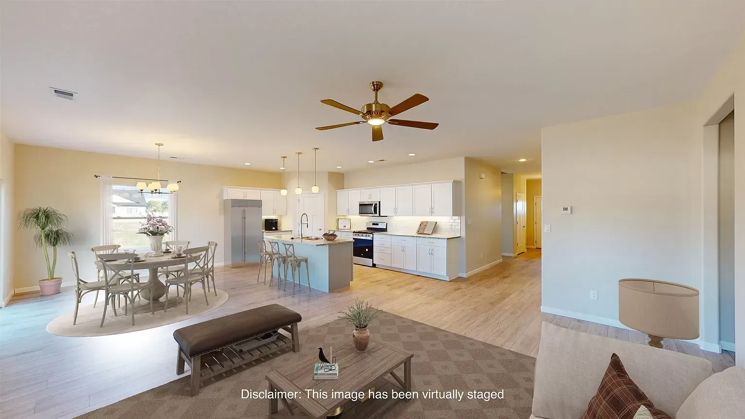 Modern great room interior with fixtures and neutral furnishings