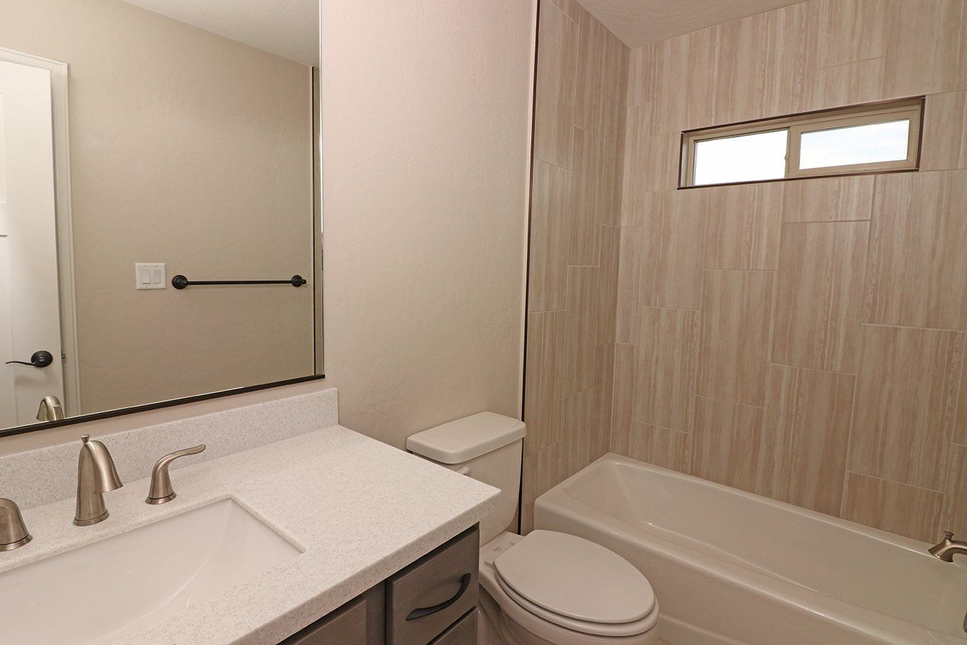 Bathroom with Tiled Shower and Tub Combo | Integrity Homes | Grand Junction, CO 81501