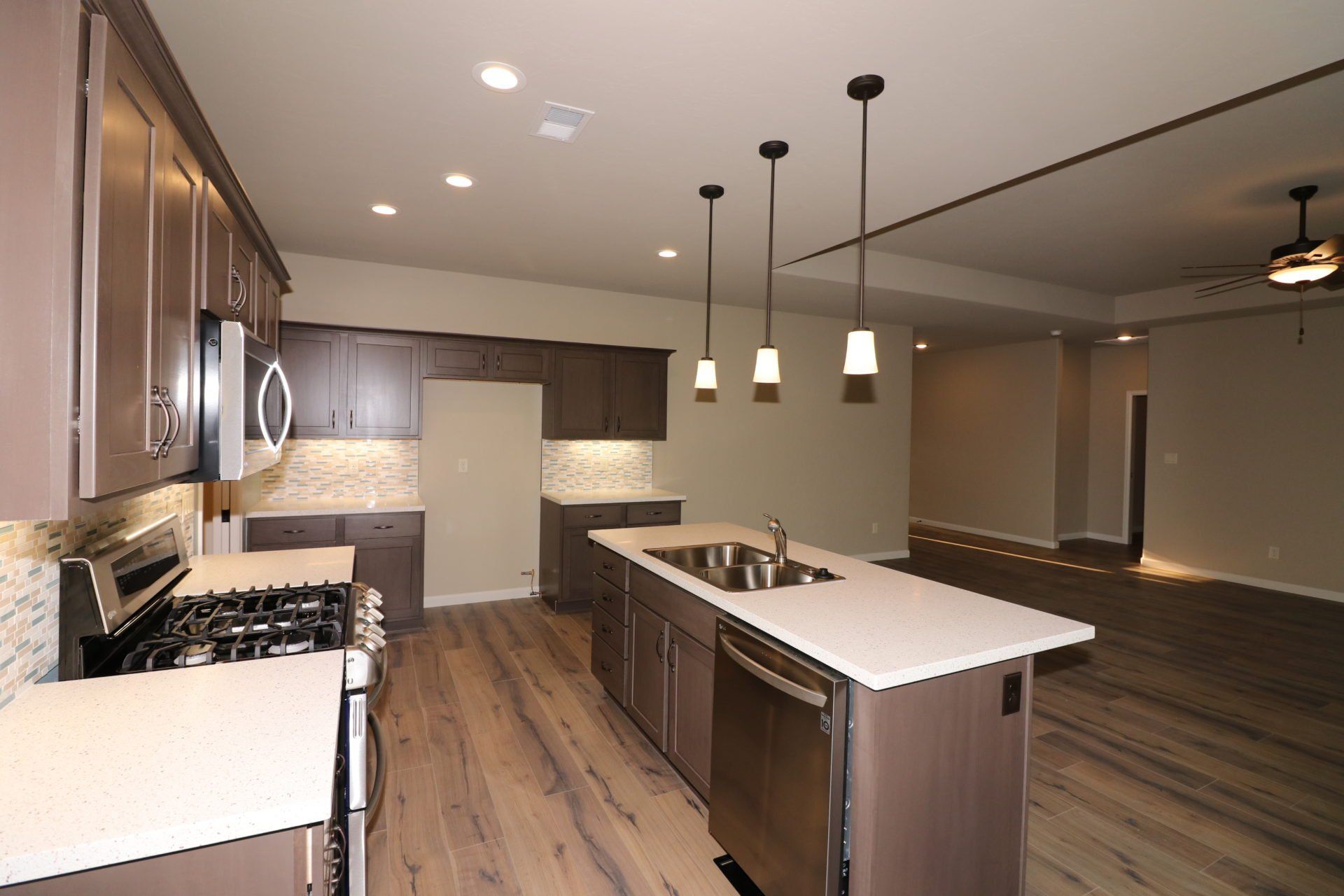 Elegant kitchen design with premium finishes and stainless gas stove