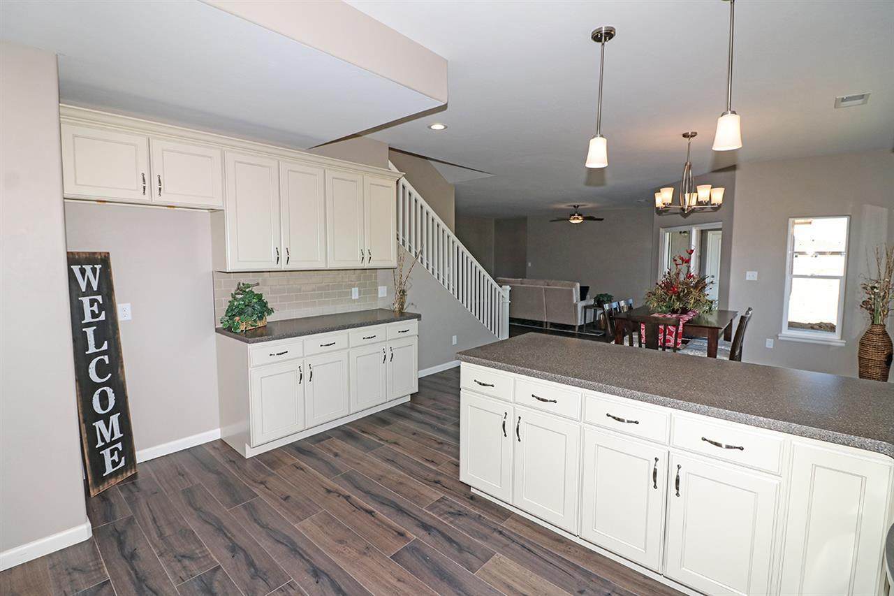 Kitchen Overlooking Dining Room and Staircase in Background | Integrity Homes | Grand Junction, CO 81501