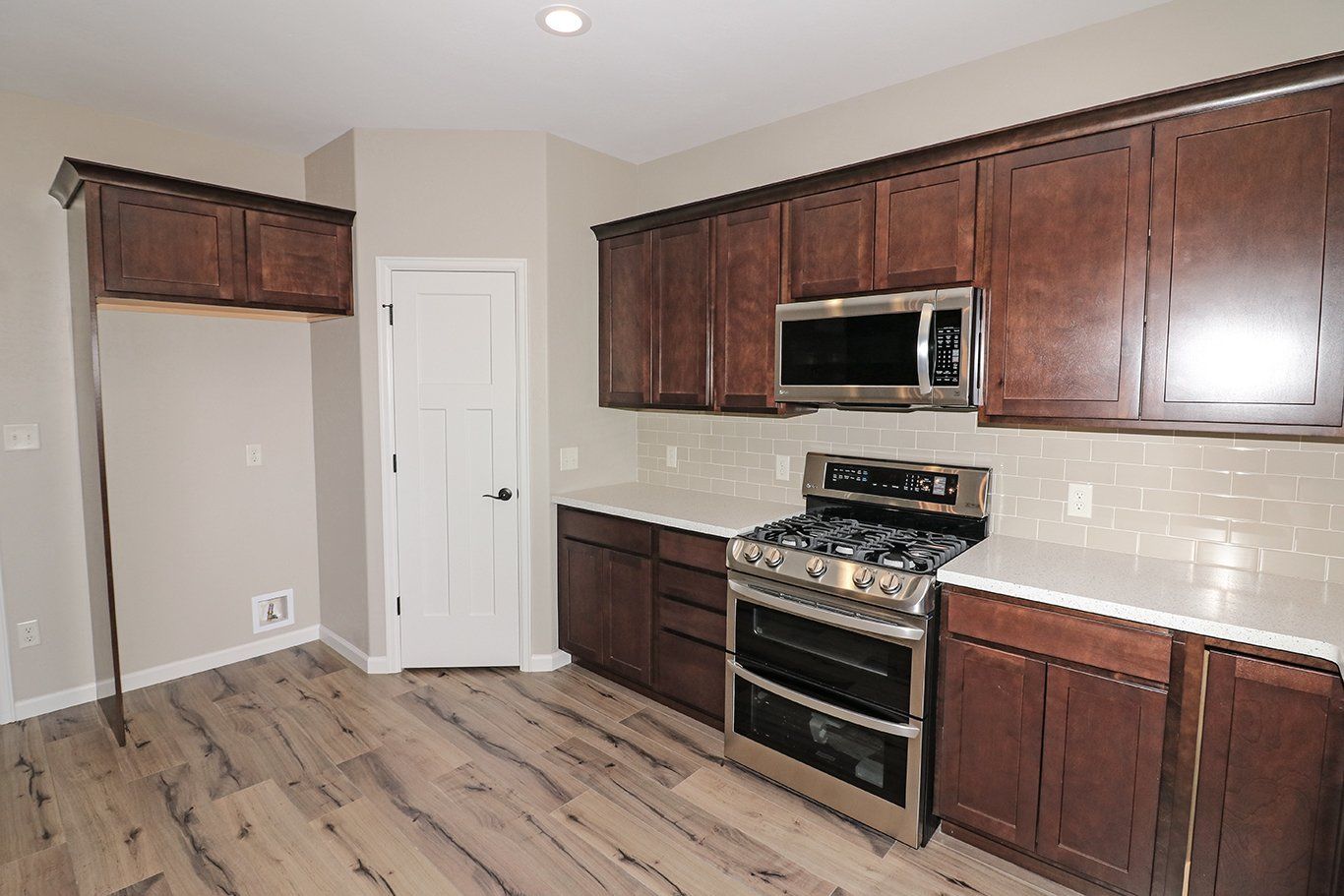 Stainless Steel Microwave and Range | Integrity Homes | Grand Junction, CO 81501