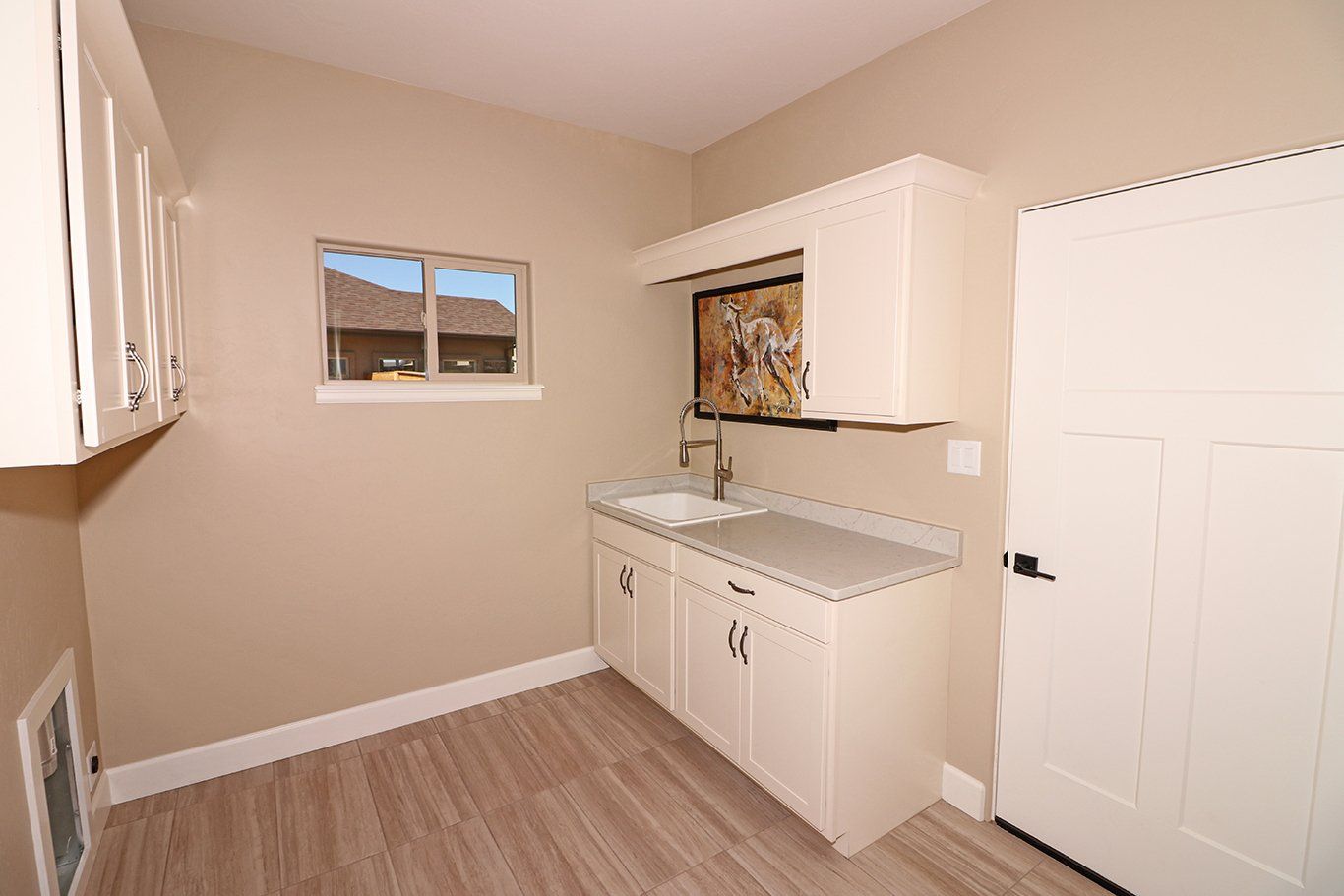 Laundry Room Cabinets and Sink | Integrity Homes | Grand Junction, CO 81501