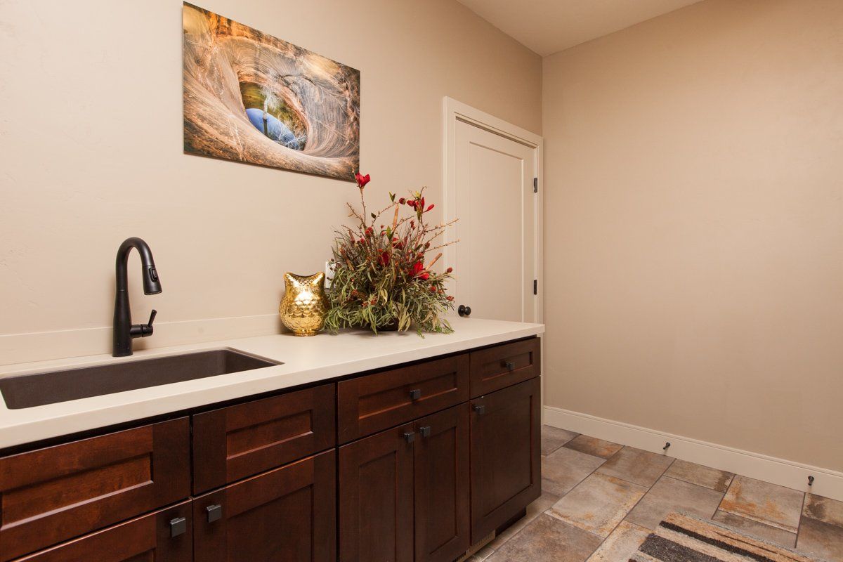 Laundry Room Cabinets and Countertop with Sink | Integrity Homes | Grand Junction, CO 81501
