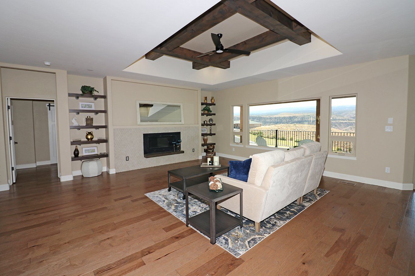 Livingroom with Built-In Shelves around Fireplace and Recessed Ceiling | Integrity Homes | Grand Junction, CO 81501