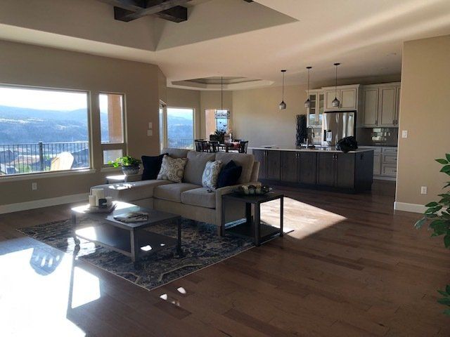 Living Room with Kitchen and Dining Room in Background | Integrity Homes | Grand Junction, CO 81501