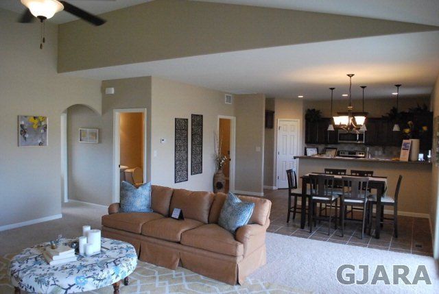Living Room with Kitchen and Dining Room in Background | Integrity Homes | Grand Junction, CO 81501