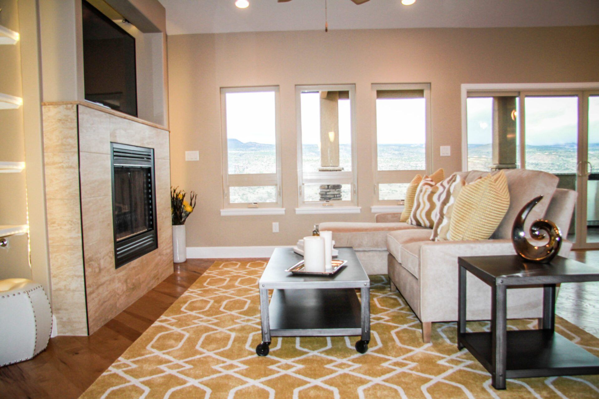 Living Room with Built-In Book Shelves around Tile Fireplace | Integrity Homes | Grand Junction, CO 81501