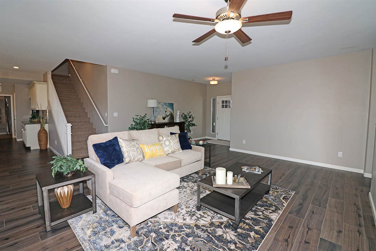 Living Room with Sectional and Front Entryway | Integrity Homes | Grand Junction, CO 81501