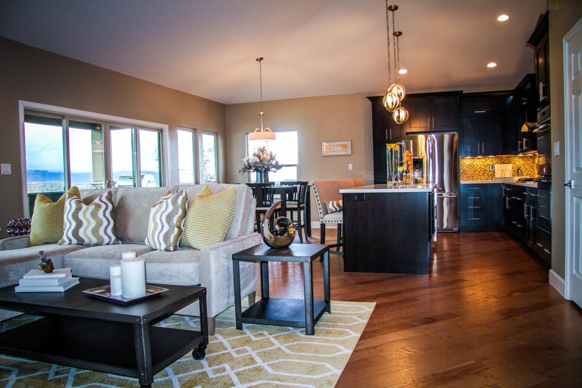 Living Room with Dining Room and Kitchen in Background | Integrity Homes | Grand Junction, CO 81501