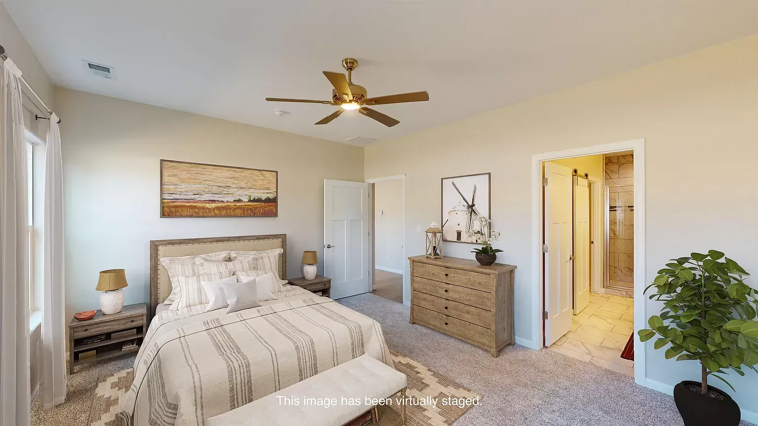 Modern bedroom layout with neutral furnishings 