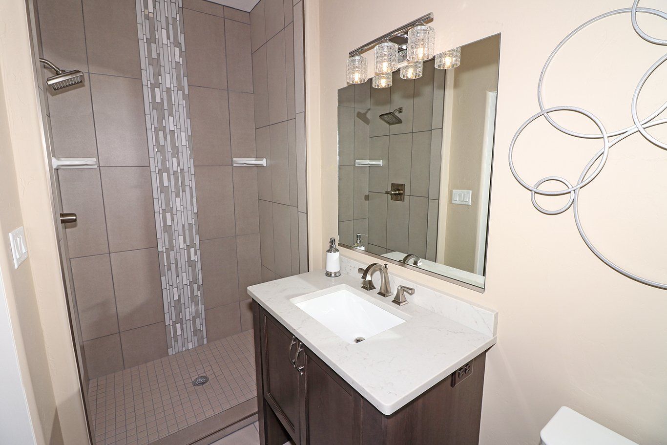 Bathroom with Tile Shower and Glass Door | Integrity Homes | Grand Junction, CO 81501