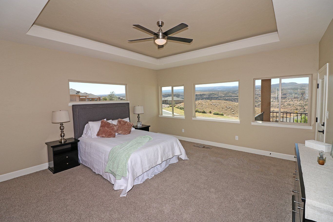 Primary Bedroom with Recessed Ceiling and Ceiling Fan | Integrity Homes | Grand Junction, CO 81501