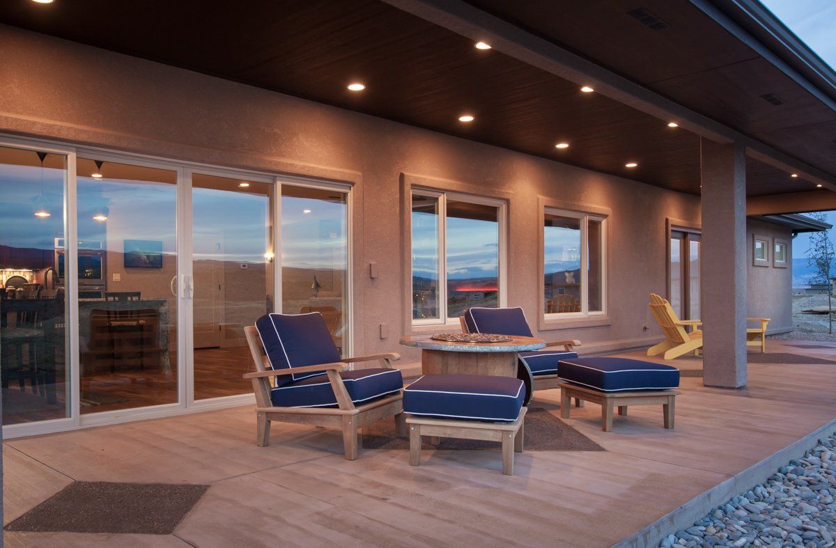 Covered Patio with Lighting, Seating, and Firepit | Integrity Homes | Grand Junction, CO 81501