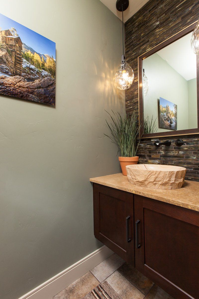 Tile Wall, Stone Sink, and Waterfall Faucet | Integrity Homes | Grand Junction, CO 81501