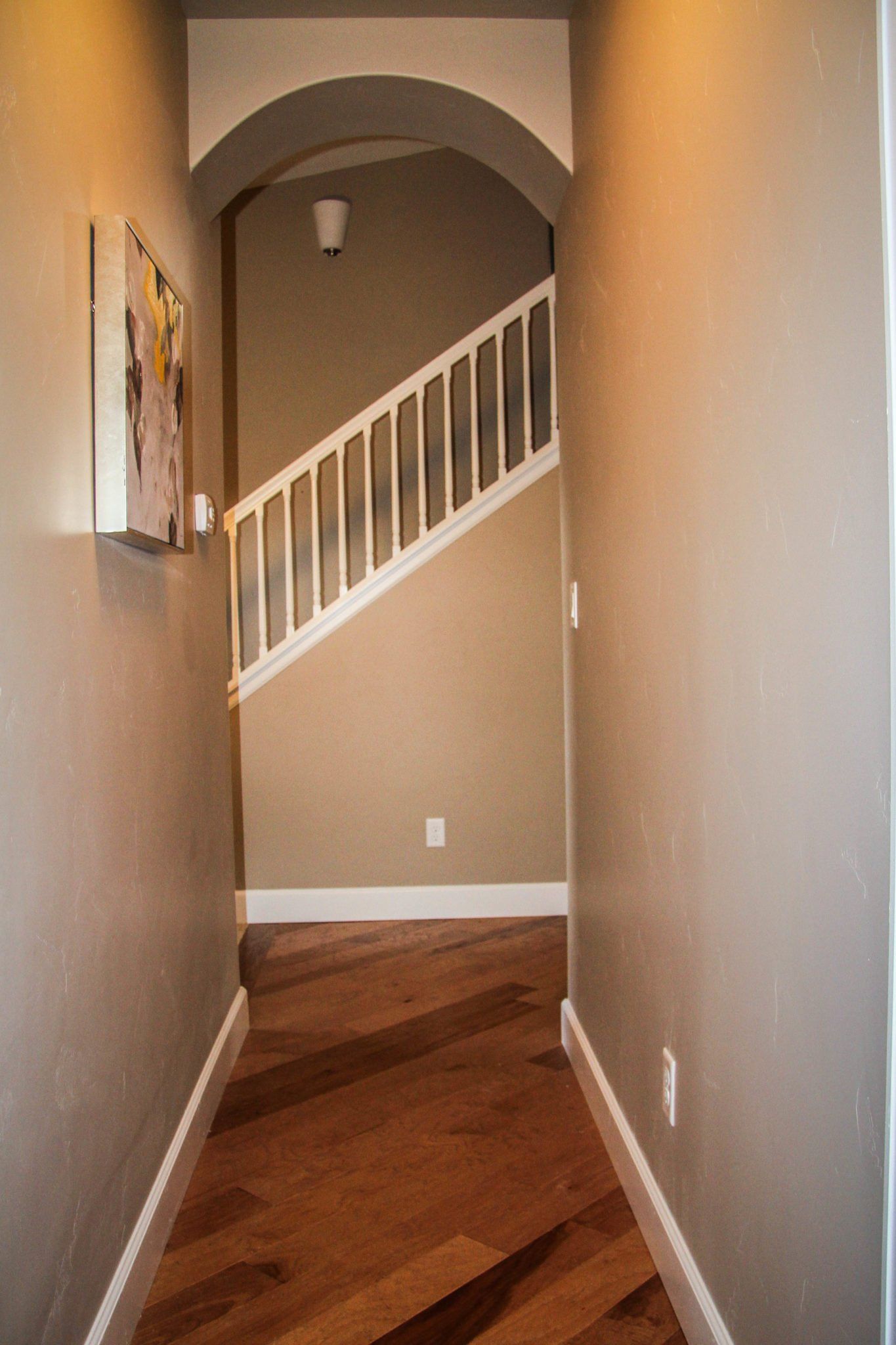 Hallway with side of Staircase at End | Integrity Homes | Grand Junction, CO 81501