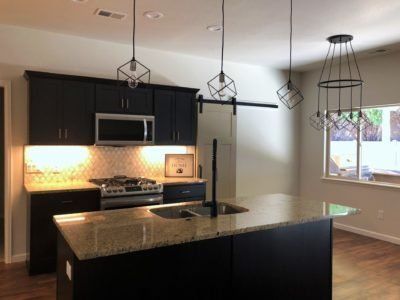 Elegant kitchen design with premium finishes and modern lighting fixtures