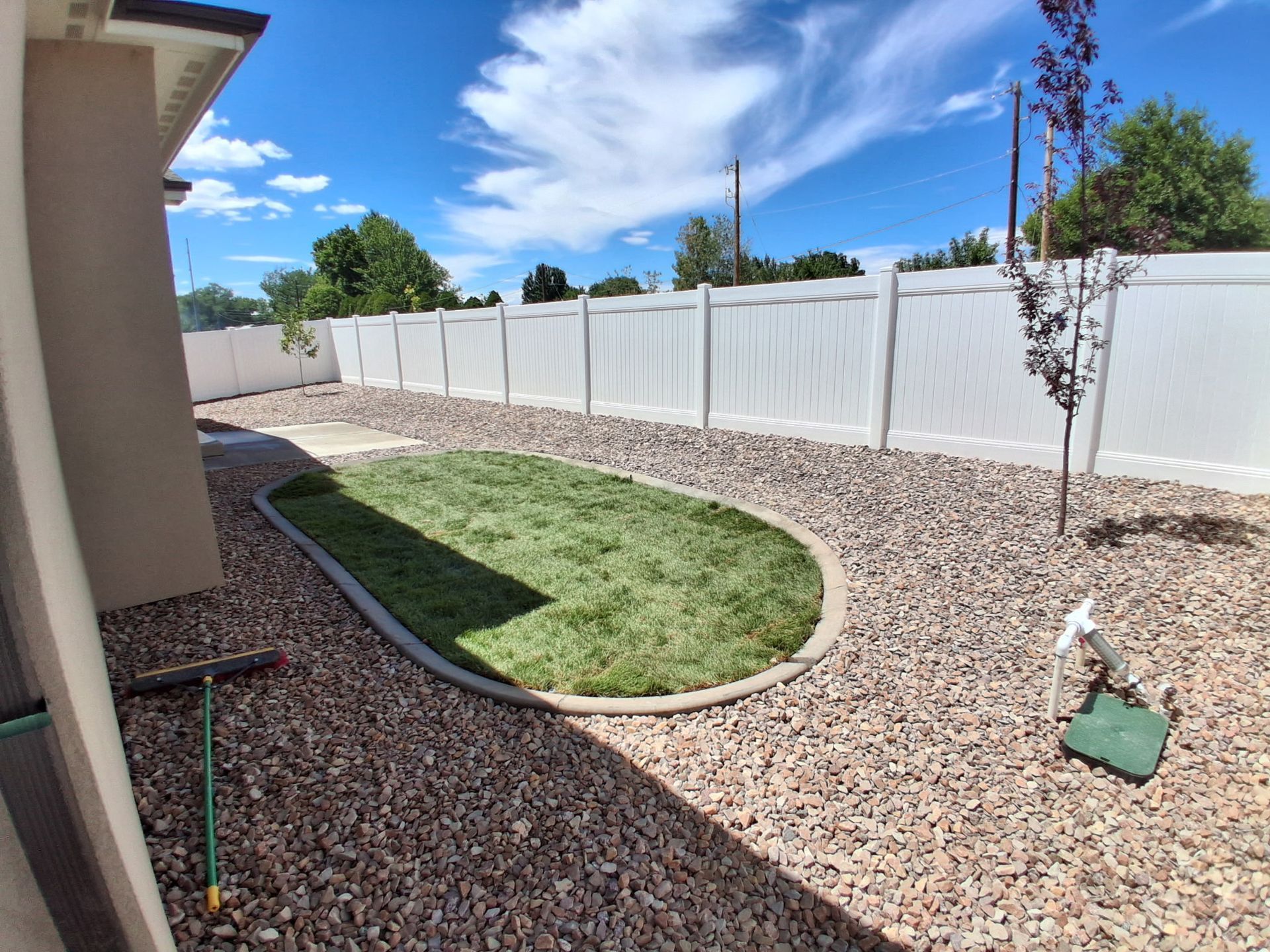 Covered back patio and yard area of The Silverado model.