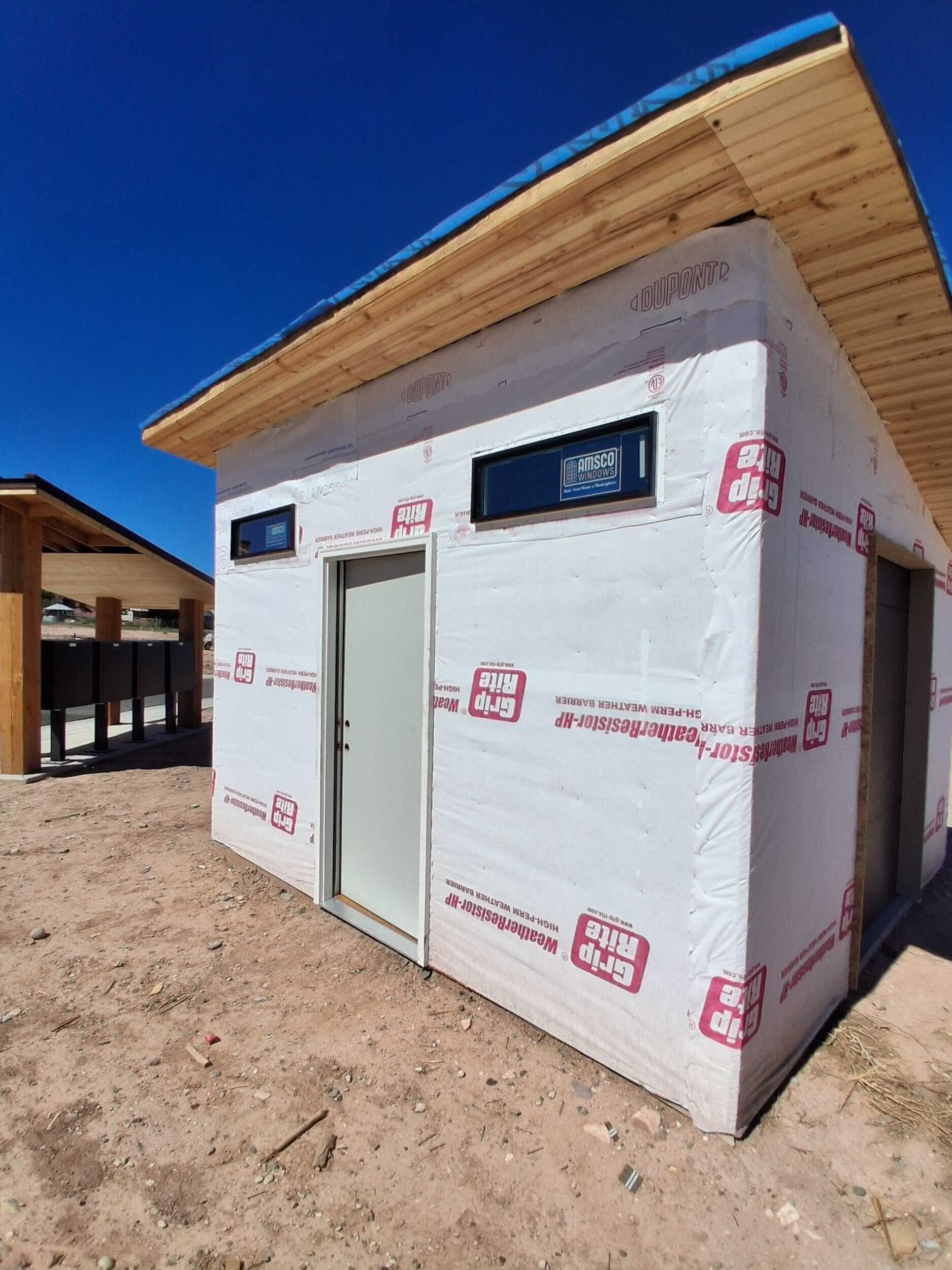 utilities being installed at a lot in Monument Ridge Estates.