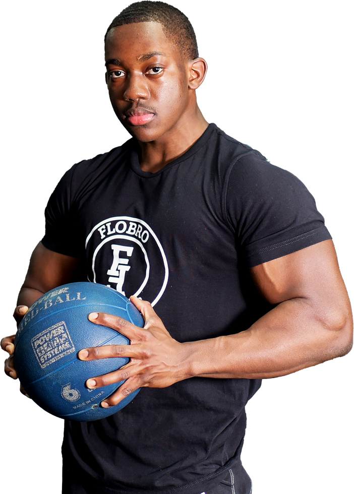 A man in a black shirt is holding a blue ball