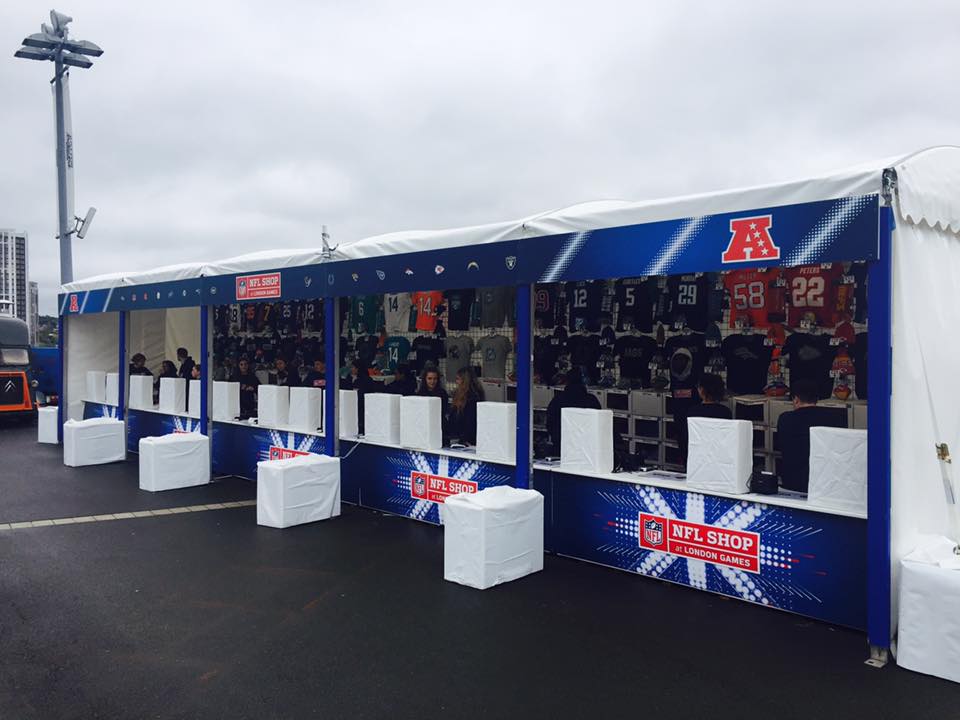 A blue and white building with a british flag on it