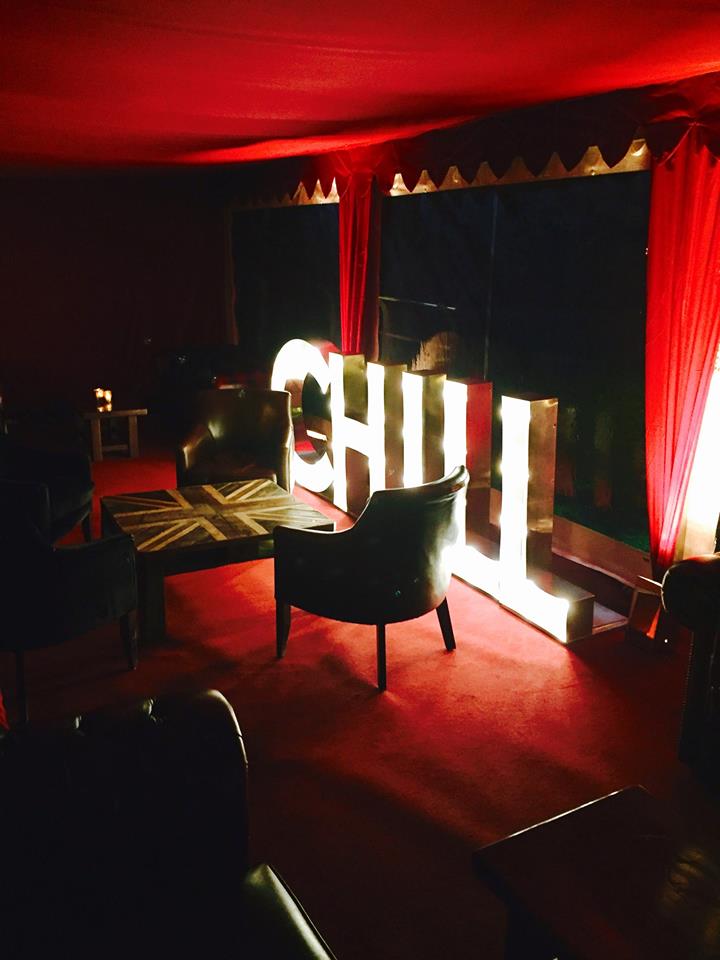 The word chill is lit up in a dark room