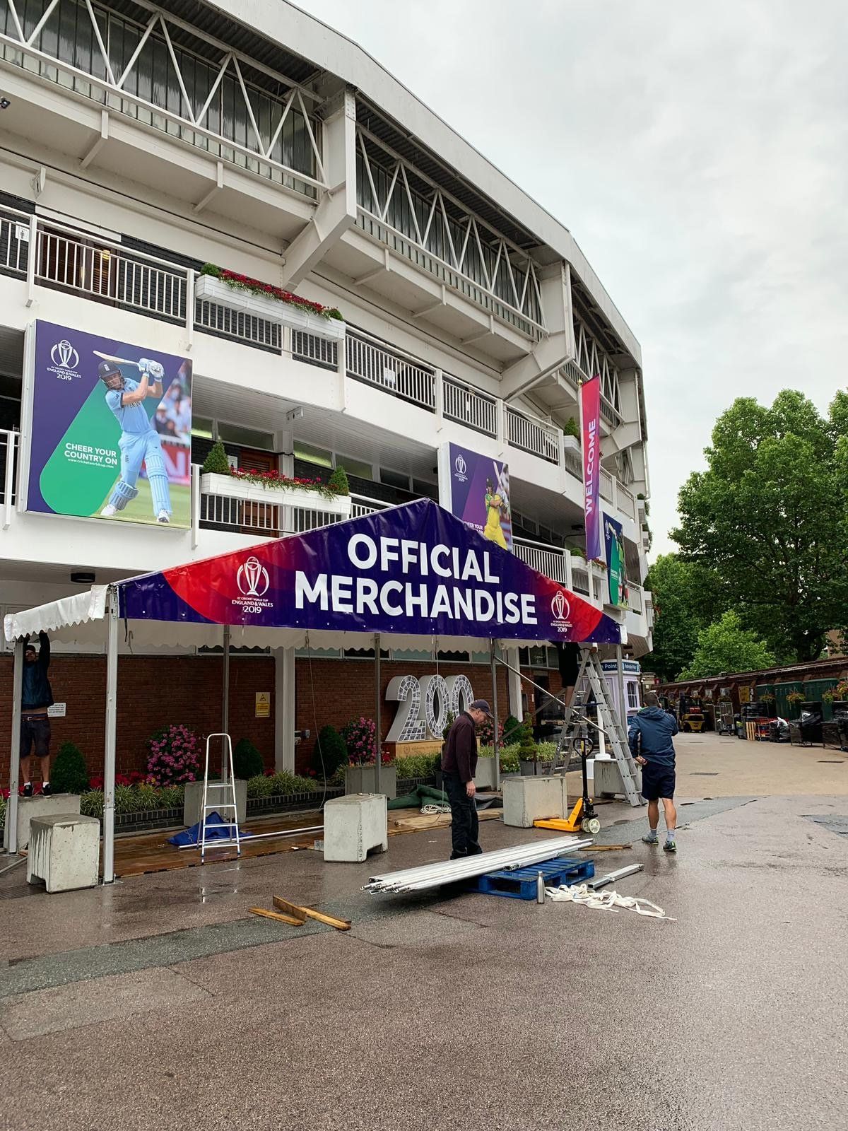 A stadium with a sign that says `` official merchandise '' on it.