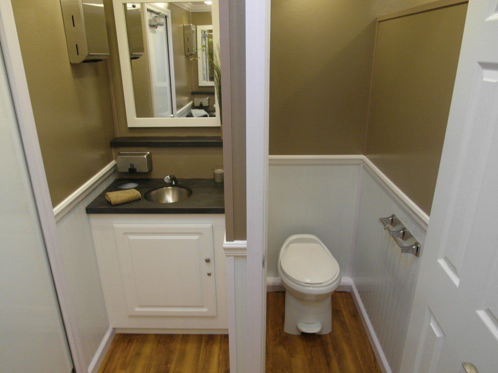 portable restroom cottage unit internal photo of men's
