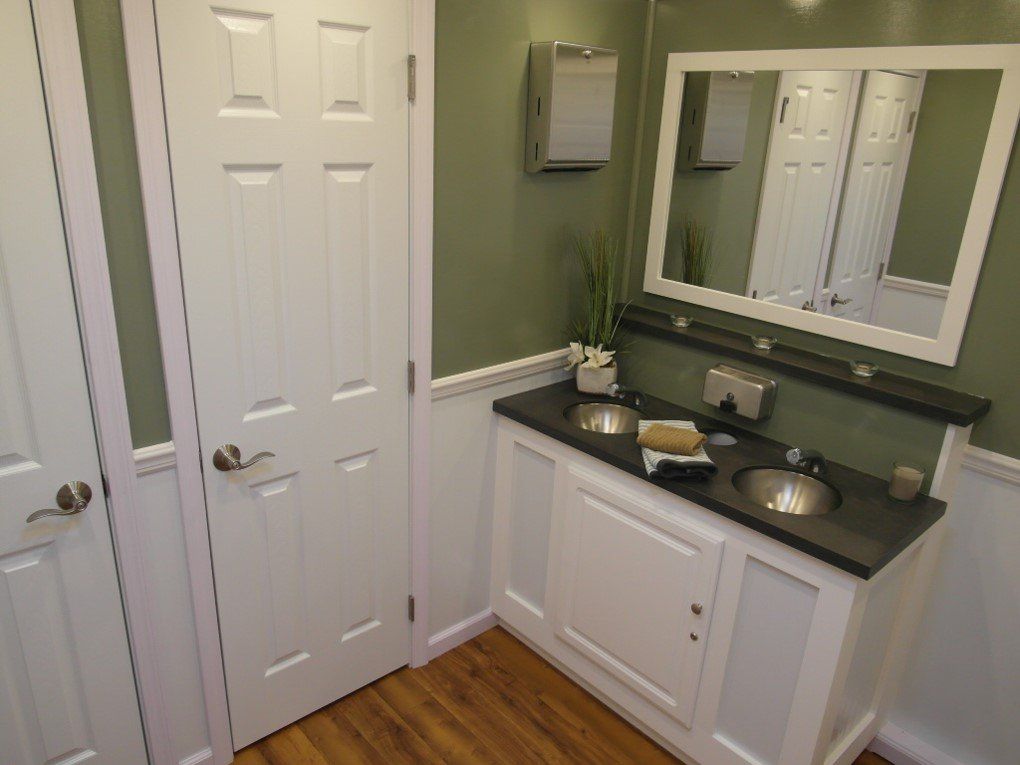 portable restroom cottage unit interior photo of women's