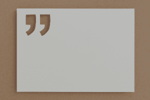 A piece of paper with a quote cut out of it