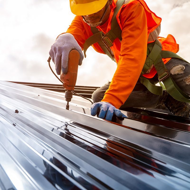 Worker Doing Roof Construction