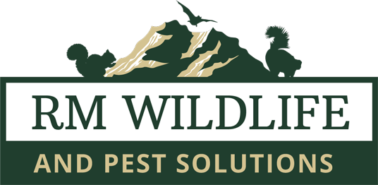 A logo for rm wildlife and pest solutions