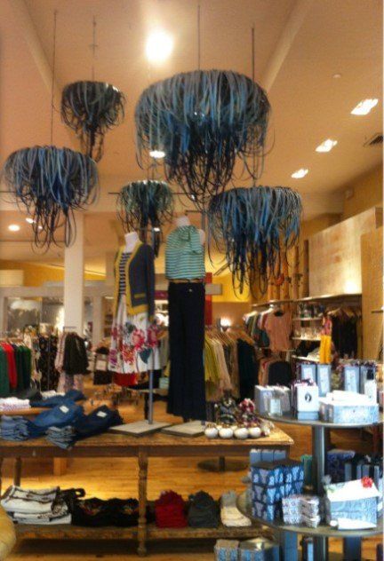 A store with jellyfish hanging from the ceiling