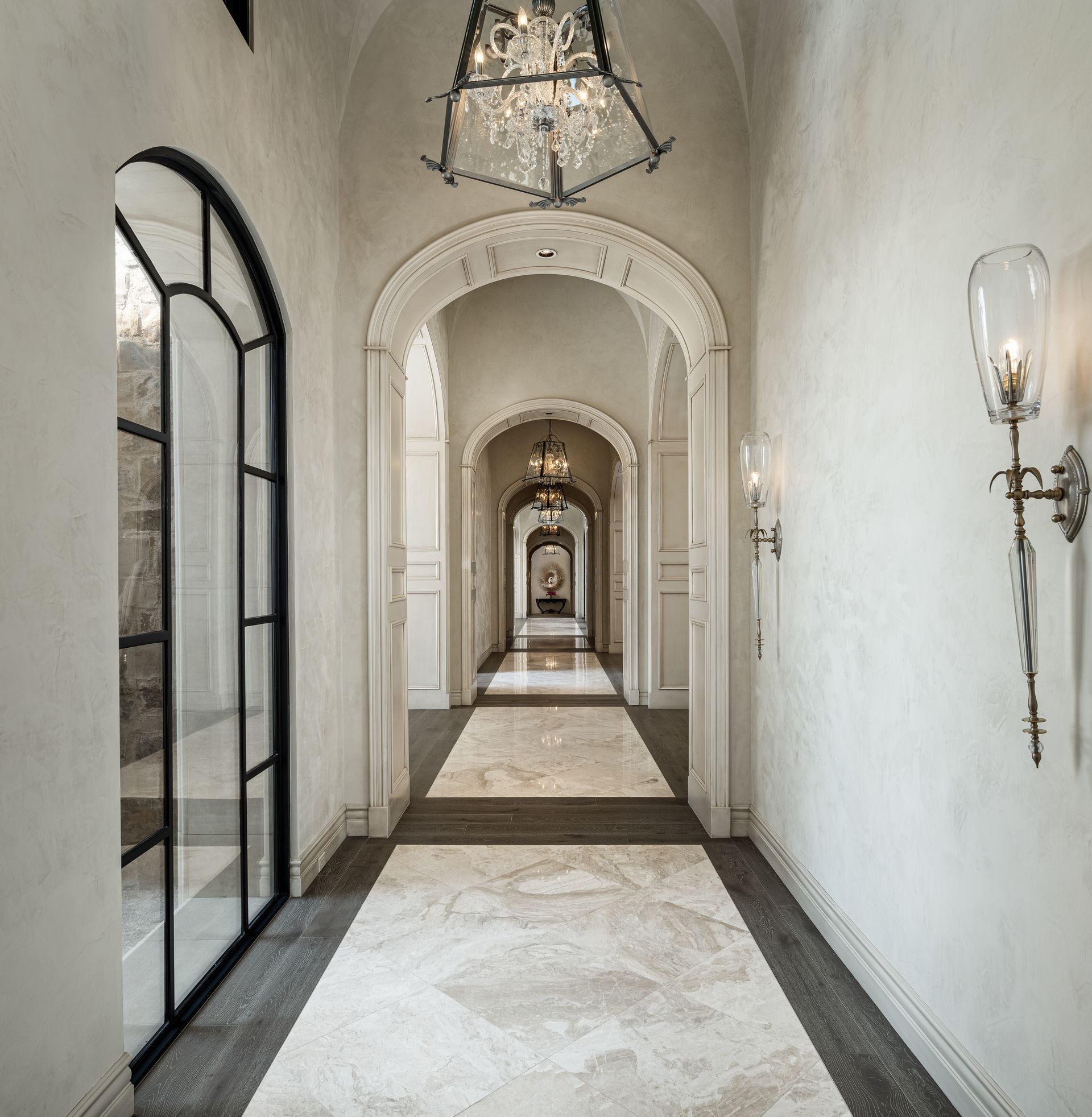 luxury hallway with wood and marble flooring