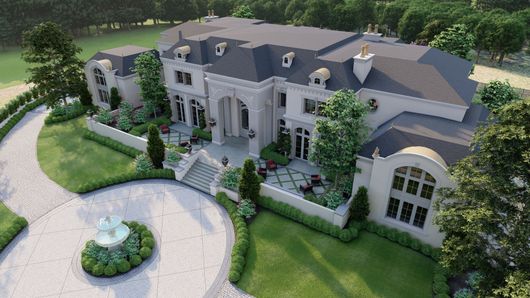 A large house with a swimming pool in front of it