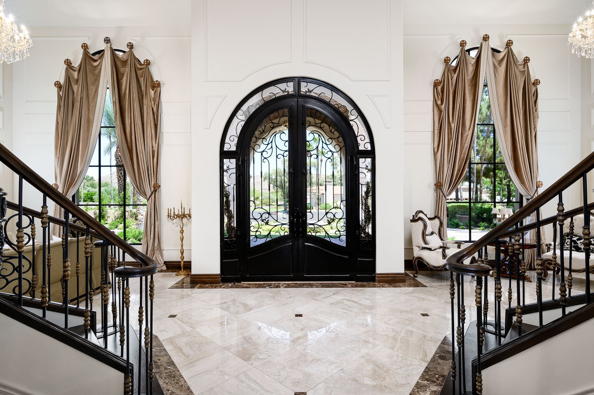 There is a staircase leading up to the front door of a house.