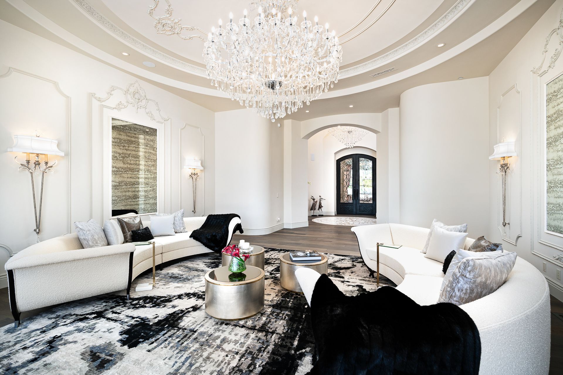 contemporary living room with a chandelier