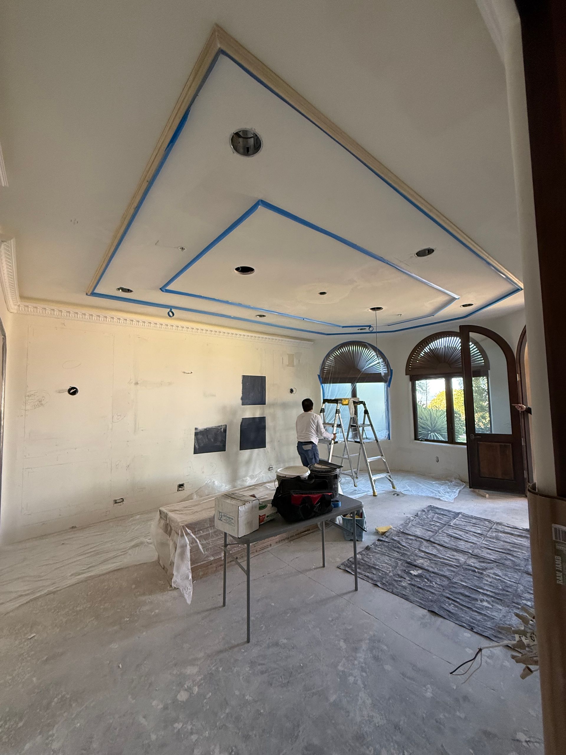 luxury custom home builder on site, ladder in scottsdale home, currently remodeling a large room