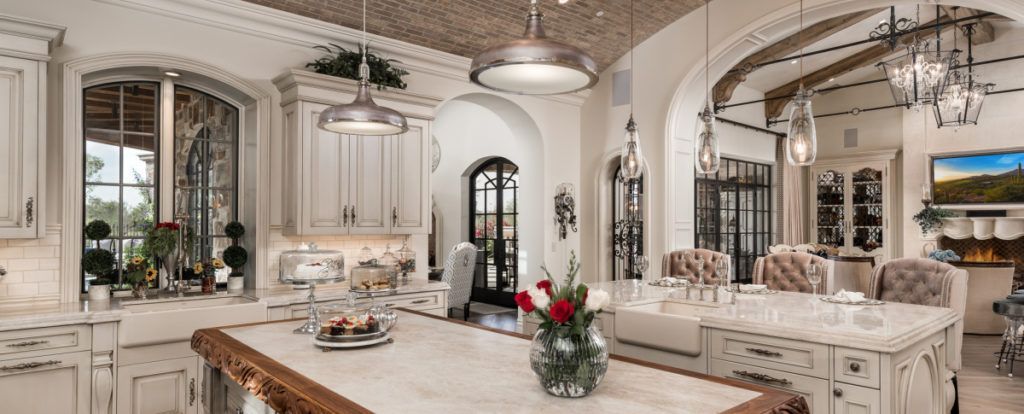 image of a kitchen with marble countertops